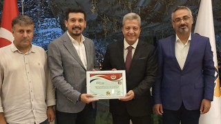 OKÜ Rektörüne Kültür ve Turizm elçisi beratı